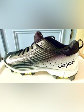 Nike Black and White Youth Baseball Cleats with Yellow Studs